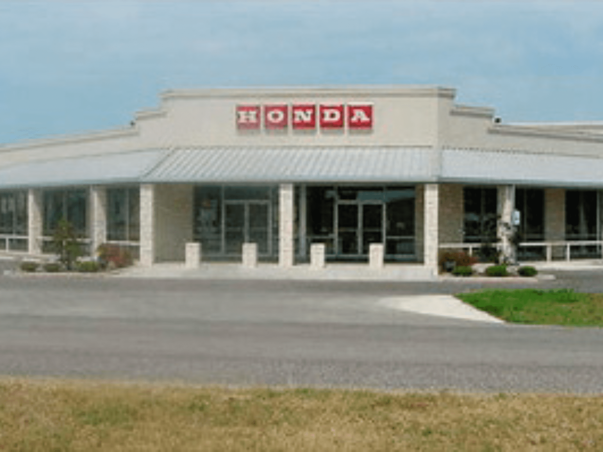 a building with a Honda sign on the front
